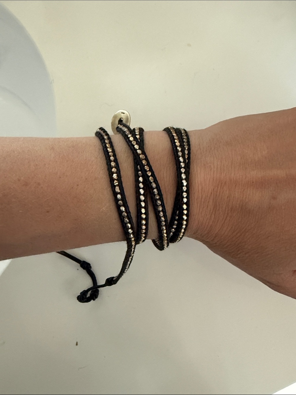 Black Multi‑Wrap Bracelet with Gold Bead Detailing